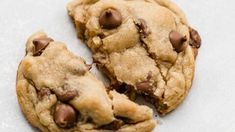 two chocolate chip cookies split in half