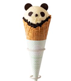 an ice cream cone with a panda face on top