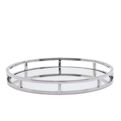 a round metal tray with mirrored sides