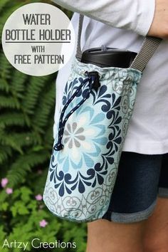 the water bottle holder with free pattern is shown in front of some plants and bushes