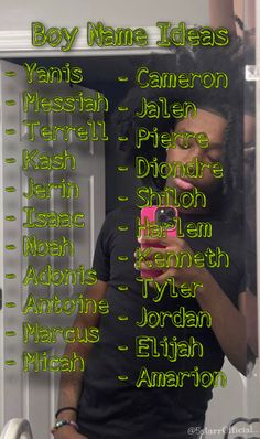 a man standing in front of a mirror looking at his cell phone with the caption'boy name ideas'written on it