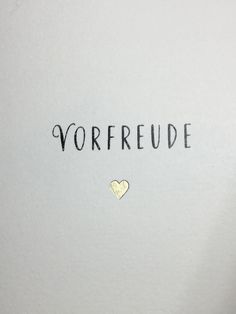 the word vorfeude is written in black ink with a heart on it