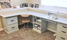 a corner desk in the corner of a room with drawers and shelves on each side