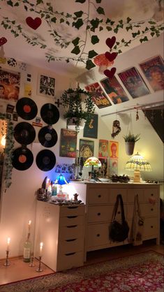 a room filled with lots of different types of decorations on the wall and ceiling above it