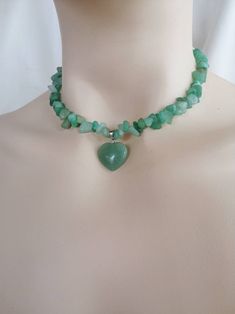 Green Aventurine Crystals are used in this stunning  necklace. * Handmade by me * Chains, intermediate apparatus and wires are resistant to darkening . (Keep away from water, parfume and other chemicals)  * Length 35-40 cm. Adjustable. (Can be made in different size according to your request.) Please message me if you have any questions. Check out my store for more unique necklaces; https://www.etsy.com/shop/OpisDesign Raw Aventurine, Birthday Gift Aesthetic, Green Crystal Necklace, Green Aventurine Necklace, Gift Aesthetic, Green Aventurine Crystal, Aventurine Necklace, Aventurine Crystal, Crystal Heart Pendant