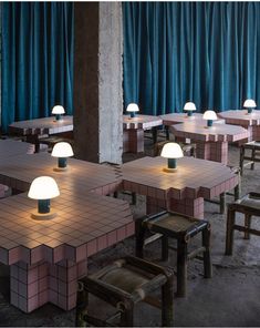 an empty restaurant with several tables and chairs