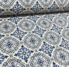 a blue and white patterned fabric