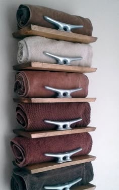 a stack of towels hanging on a wall