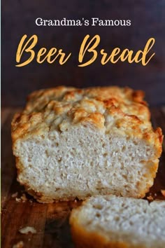 a loaf of beer bread sitting on top of a wooden cutting board with the words grandma's famous beer bread