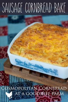 a casserole dish on a wooden tray with the words sausage cornbread bake above it