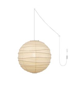 a white light hanging from the ceiling with two cords attached to it and a round paper lantern