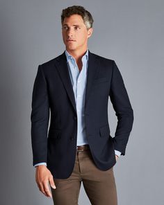 100% wool, Available in slim fit and classic fit, 100% Woolmark certified fine Merino wool, Back panel lining: 52% polyester, 48% viscose in navy, Lining: Front panel 100% polyester in exclusive Charles Tyrwhitt lapwing design in navy, Contrast piping in blue to add a striking pop of colour on the interior lining, Single breasted, two-button fastening with four button cuff using Urea buttons, Canvas chest piece construction - Proper Blazer - Navy Suits Navy Blue, Shoes For Grey Suit Men, Men Blazers Outfit, Contrast Suits For Men, Men Sport Jacket Outfit, Business Casual Blazer Outfits Men, Mens Blue Blazer, Mens Blue Dress Pants Outfit, Mens Executive Fashion