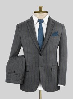 Enhance your appearance with our Loro Piana Antonella Wool Suit, showcasing a refined sense of elegance that defines your classy look. Meticulously crafted from pure wool fabric, The suit displays a polished stripe motif featuring a harmonious interplay of gray and distinguished blue hues. This amalgamation exudes an ageless charm, elevating it to the status of a true sartorial masterpiece. Whether you're attending a formal office meeting or a refined dinner event, this suit is designed to ensur Elegant Wool Suit And Tie Accessories For Business, Elegant Wool Suits For Office, Tailored Elegant Wool Double Breasted Suit, Elegant Tailored Wool Double Breasted Suit, Elegant Tailored Double Breasted Wool Suit, Pinstripe Wool Suit For Office, Tailored Striped Double Breasted Suit For Business Casual, Pinstripe Fitted Suit For Business Casual, Elegant Single Breasted Wool Suit