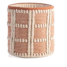 an orange and white basket on a white background