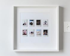 a white frame with six photos in it