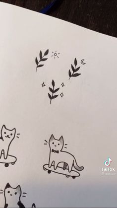 an image of cat stickers on a piece of paper