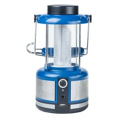 a blue and silver lantern is shown on a white background with the light turned on