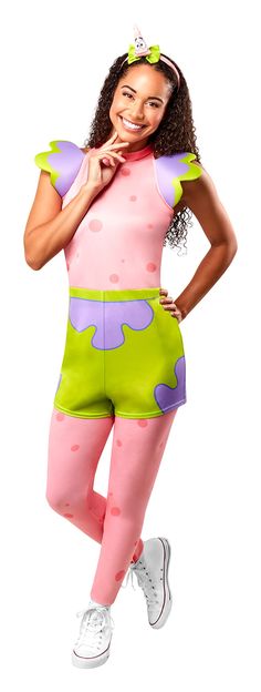 a woman in pink and green costume posing for the camera with her hands on her hips