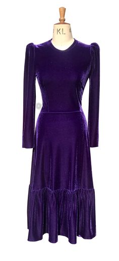 Welcome And thank you for visiting an official Baylis & Knight listing Hand made for you in the UK this dress is made from luxurious purple velevt, featuring long puff sleeves and a round neckline, this dress is feminine, elegant and comfortable. to wear. The tiered skirt is designed to flatter the figure. This is a pull on style and is unlined. Hand wash only Size Guide BUST WAIST HIP SIZE 8 32 24 35 SIZE 10 34 26 37 SIZE 12 36 28 39 SIZE 14 38 30 41 SIZE 16 40.5 32.5 43.5 SIZE 18 43 35 46 Prarie Dress, Midi Dress Wedding, Midi Dress Wedding Guest, Wings Dress, Puff Sleeve Midi Dress, Dress Wedding Guest, Circle Dress, Long Jumpsuits, Purple Velvet