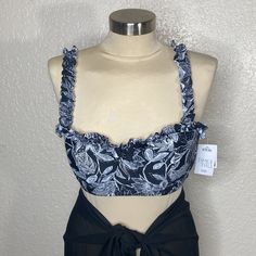 Very Nice Swimsuit Top Ruffles Straps Underwire Adjustable At The Back Double Straps Size Large Black Swimwear With Built-in Bra For Spring, Black Tops For Poolside Spring Occasion, Black Summer Pool Tops, Black Summer Top For Poolside, Black Tops For Poolside Summer, Black Summer Poolside Top, Black Ruffled Tankini For Vacation, Black Floral Print Beachwear Tops, Black Lined Summer Tankini