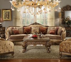 a living room filled with furniture and a chandelier