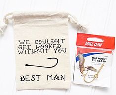 a bag with a fishing hook on it next to a card that says, we couldn't get hooked without you best man