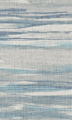 an abstract blue and white background with small waves on the fabric in shades of gray