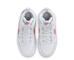 Nike Court Borough 2 Mid Little Kid Girls' Sneaker Make your little girl the coolest kid in preschool with this Court Borough 2 Mid girls' Sneaker , inspired by the Nike Air Jordan 1 Mid. Featuring a leather upper with a timeless design that includes the classic Swoosh branding, sporty looks so good on her. The perforated toe panel adds another touch of style to this nostalgic Shoe. Leather upper Lace-up closure w/ankle strap Padded collar /tongue Cushioned insole Rubber outsole Nike Court Borough, Sporty Looks, Nike Air Jordan 1 Mid, Mid Top Sneakers, Rack Room, Rack Room Shoes, Nikes Girl, Nike Air Jordan 1, Mid Top