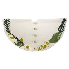 an embroidered white collar with green leaves and flowers