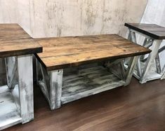 two wooden tables sitting on top of a hard wood floor