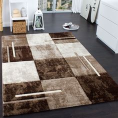 a brown and white area rug in a living room