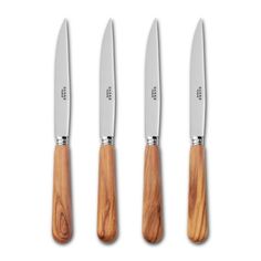 three knives with wooden handles are shown on a white background and one is in the middle