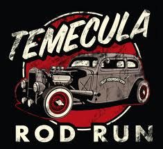 an old timey car with the word tequila on it's back and red rims