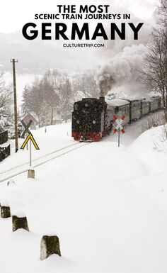 a train traveling through snow covered countryside next to trees and power lines with text overlay reading the most scenic train journey in germany