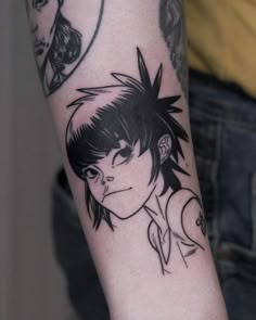 a person with a tattoo on their arm