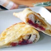 two pastries sitting on top of a white plate