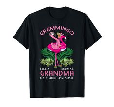 a black t - shirt with an image of a flamingo wearing a pink dress