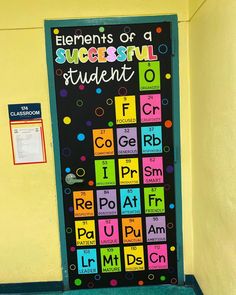 a classroom door decorated with colorful blocks and letters that spell out the word, elements of a successful student