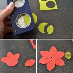 some paper flowers are cut out and placed on the ground to make an origami flower