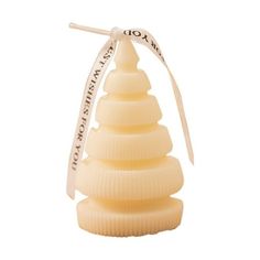 a white christmas tree ornament with a ribbon around it