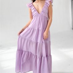 Long Purple Dress Size L From Grey Bandit! Never Worn, Brand New With Tags Lavender V-neck Maxi Dress For Spring, Lavender Tiered Dress For Spring, Spring Lavender Maxi Dress For Day Out, Casual Lavender V-neck Maxi Dress, Purple Tiered Beach Dress, Spring Lavender Maxi Dress, Elegant Lavender Dress For Vacation, Lavender Tiered Summer Dress, Purple Tiered Vacation Dress