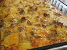 a casserole dish with meat and cheese on it in a pan, ready to be eaten