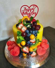 there is a cake that has fruit on it