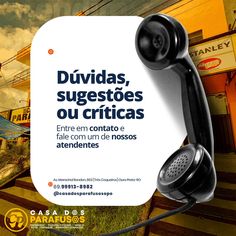 an advertisement with a telephone on the side of a building that says duviddas, sugestoes ou criticas