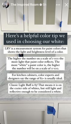 a kitchen with white cabinets and blue tape on the counter top that says here's a helpful color tip we used in choosing our white