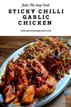 a plate with chicken, noodles and sauce on it that says sticky chili garlic chicken