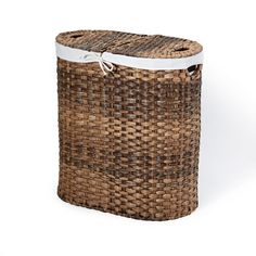 a brown basket with white handles on a white background