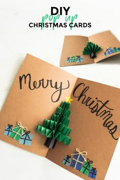 two christmas cards with the words merry christmas written on them and a tree made out of origami