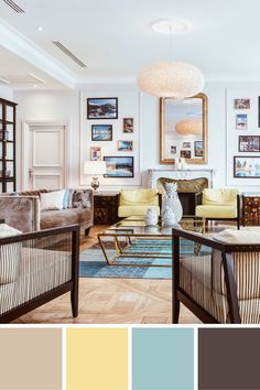 a living room filled with furniture and pictures on the wall