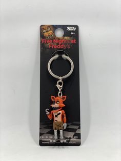 the five nights at friday's keychain has a fox figure on it